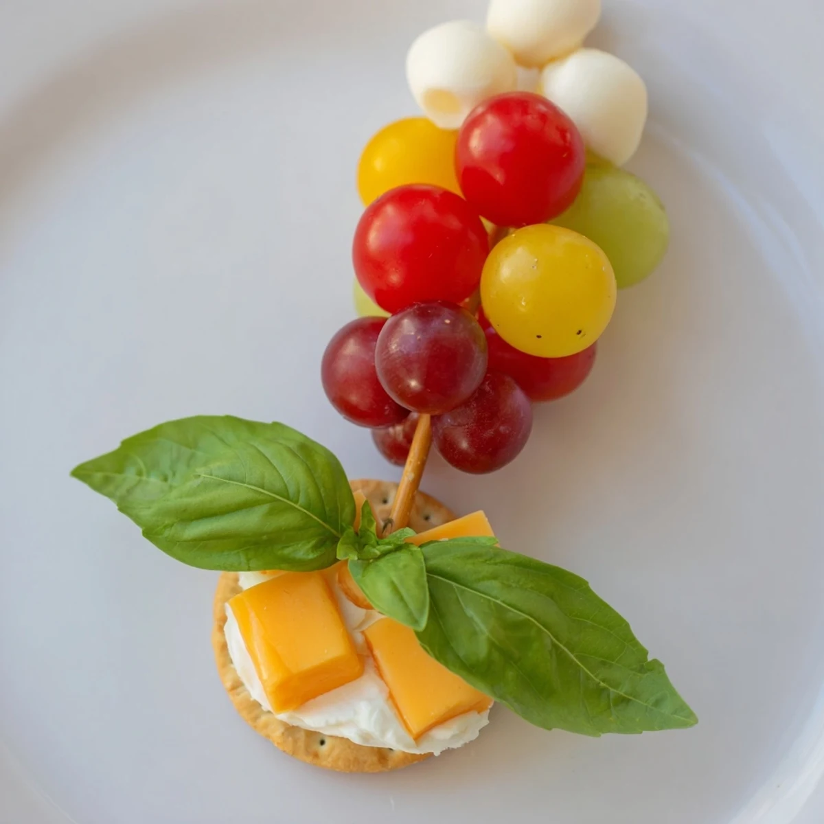 Imagine a platter of delightful Up, Up, & Away Hot Air Balloon Snacks with fresh parsley garnish.