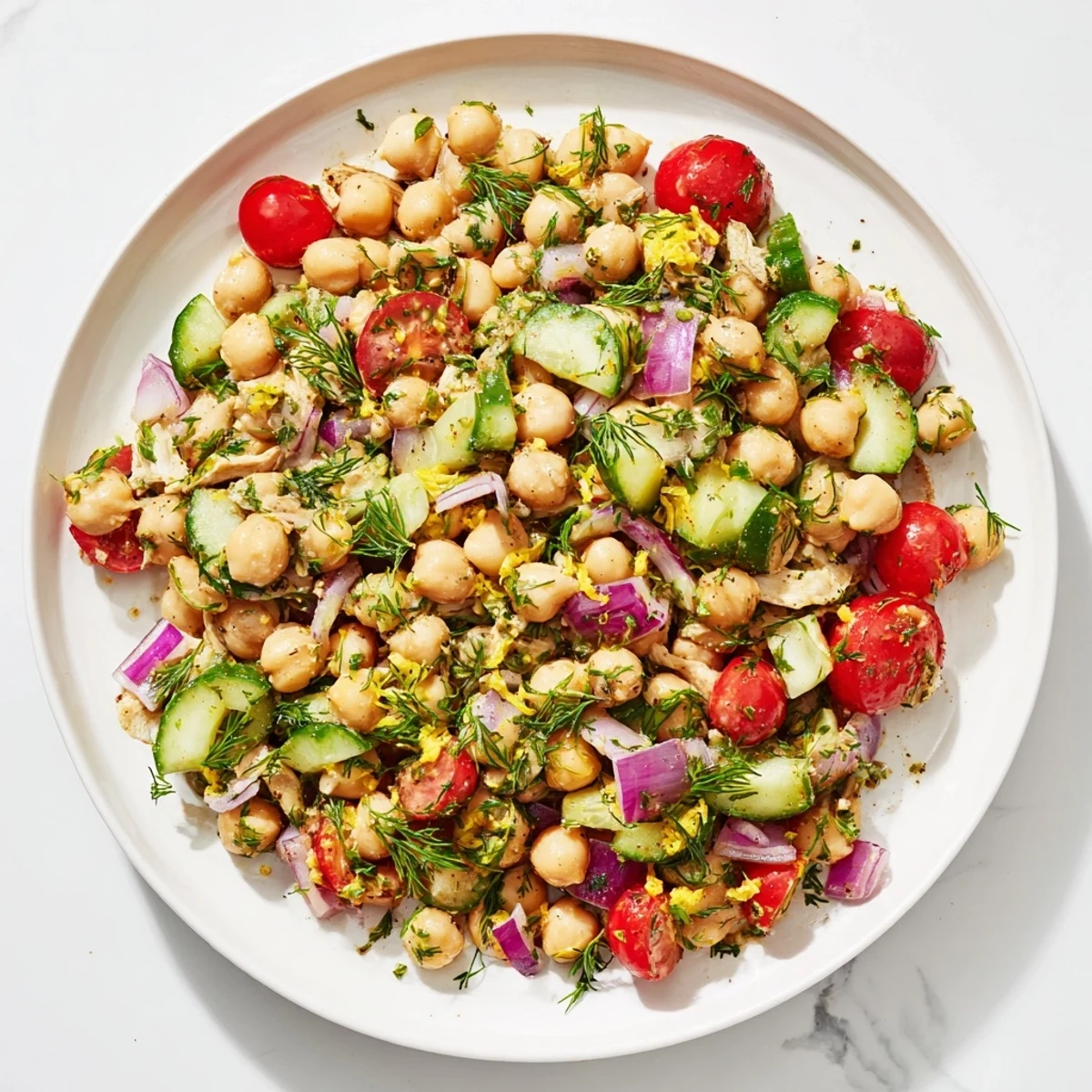 A close-up shot of a refreshing Dense Bean Salad with Lemon-Dill Chicken, perfect for a light meal.