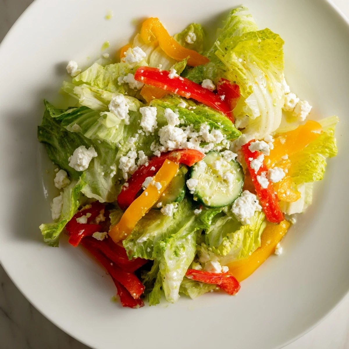 Bright and refreshing Bella Hadid Salad with vibrant red peppers and crumbled feta cheese, perfect for lunch.