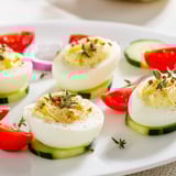 Everything bagel seasoning brightens these Brunch Board slices of hard-boiled eggs for serving.