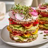 This gorgeous Gluten-Free Gourmet Tower appetizer offers a variety of textures with inviting gluten-free bread and crackers.