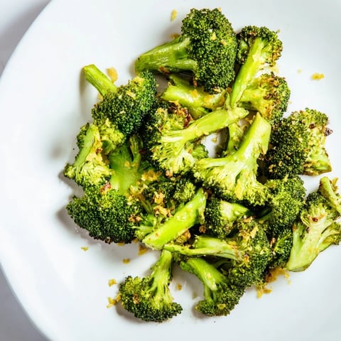 Golden-brown Lemon Garlic Roasted Broccoli, seasoned perfectly, ready to serve alongside your dinner.