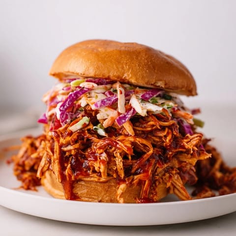 Smoky BBQ jackfruit sliders with creamy coleslaw: a delicious plant-based take on pulled pork.