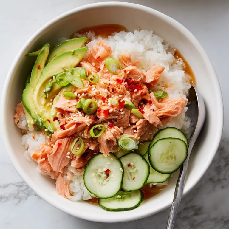 Enjoy a quick leftover salmon and rice bowl, bursting with flavors and textures.