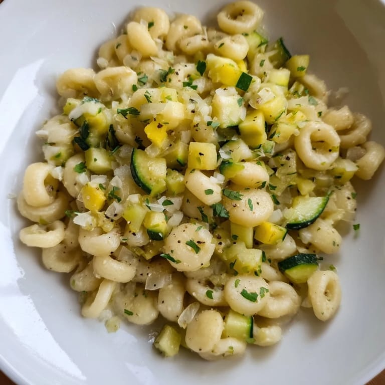 A close-up of One-Pot Creamy Zucchini Ditalini showing creamy pasta and tender zucchini pieces.