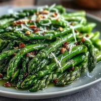 Shaved asparagus salad with lemon and Parmesan, fresh and vibrant with citrus zest and nutty cheese.